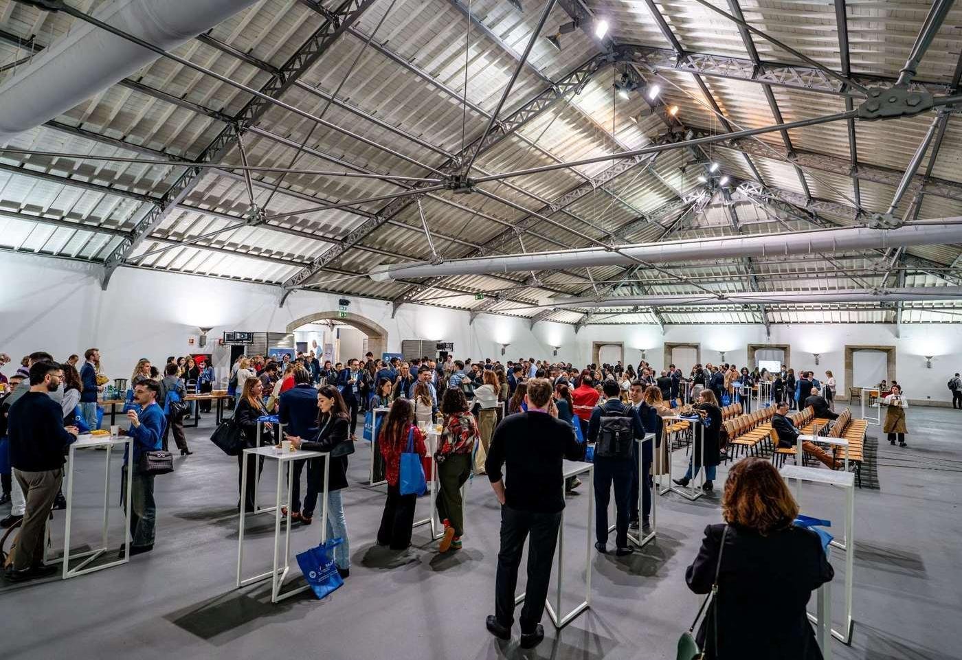 Delegates networking, as pictured in the sponsorship prospectus